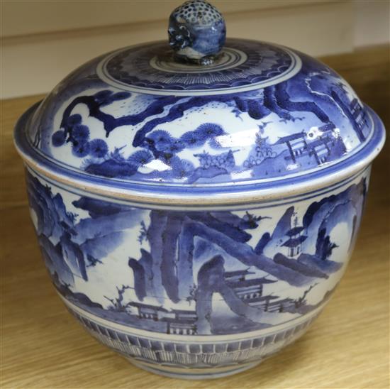 A 19th century Chinese blue and white large bowl and cover, with pomegranate finial (cover repaired)